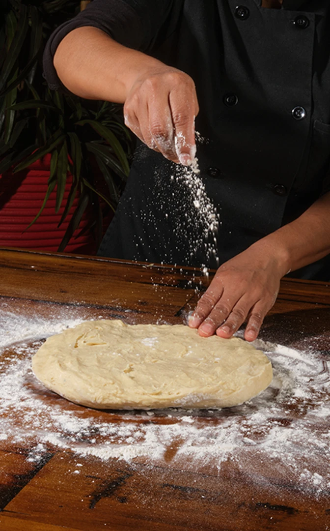 Empanada dough rolled and cut in the Loaded Empanadas kitchen