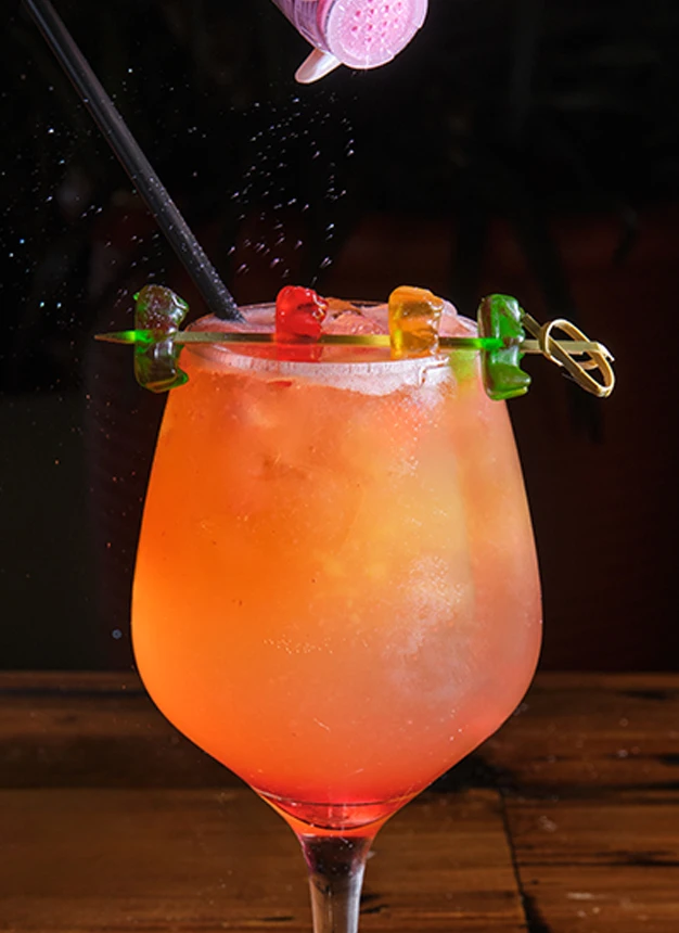 Passionberry sangria poured over fresh fruit at the Loaded Empanadas bar