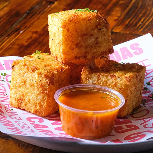 Naturally gluten-free tapioca cheese bites, crisp outside and stretchy inside